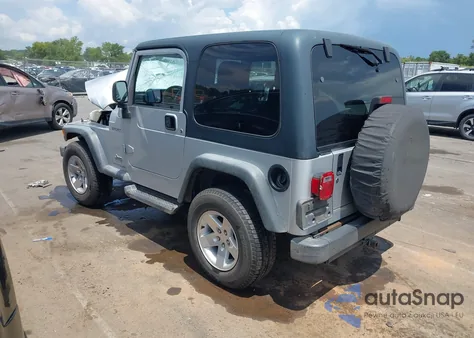 2003 Jeep Wrangler Sport z USA, uszkodzony, nr VIN 1J4FA49S33P313343
